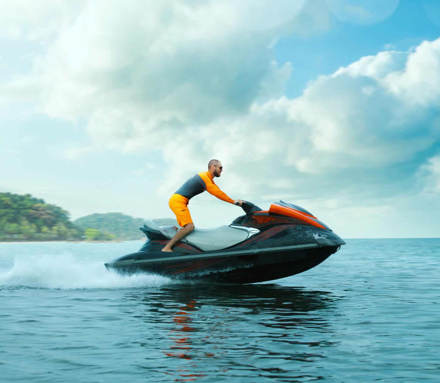 man on jetski in open water powered by a Yuasa Battery
